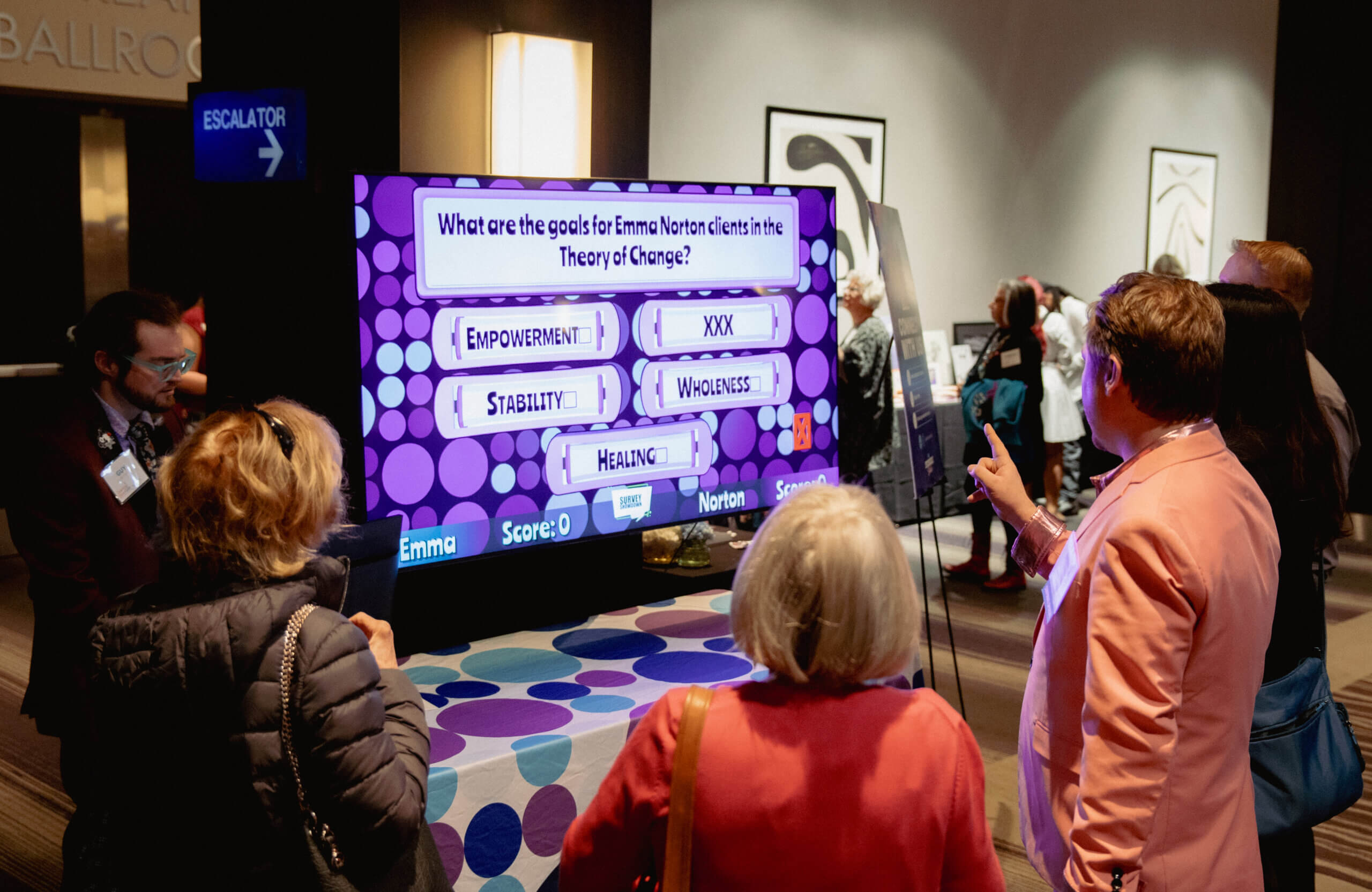 Attendees at open door gala standing by games